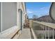 Outdoor balcony showcasing metal railings and a view of the surrounding neighborhood and mountains at 2509 April Breeze Ln, Henderson, NV 89002