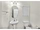 Cozy bathroom featuring pedestal sink and a neutral color scheme at 2509 April Breeze Ln, Henderson, NV 89002