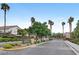 Entrance to the Old Vegas Ranch community shows mature landscaping and well-maintained roadways at 2509 April Breeze Ln, Henderson, NV 89002