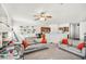 Spacious living room with neutral tones and cozy furniture for relaxing and entertaining at 2509 April Breeze Ln, Henderson, NV 89002