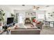 Comfortable living room with lots of natural light coming in from the sliding glass doors at 2509 April Breeze Ln, Henderson, NV 89002