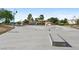Modern skatepark with smooth concrete surfaces, rails, and various features for skateboarding at 2509 April Breeze Ln, Henderson, NV 89002