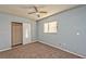 Cozy bedroom with carpet flooring, a closet, and a window for natural light at 2708 Bello Dr, North Las Vegas, NV 89030
