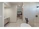 Bright bathroom featuring a glass shower, a free-standing tub, and a vanity with a modern sink at 29 Falling Ridge Ln, Henderson, NV 89011