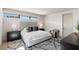Sunlit bedroom with a comfortable bed, stylish furnishings, and modern decor at 29 Falling Ridge Ln, Henderson, NV 89011