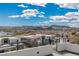 Enjoy sweeping city and mountain views from this modern home's balcony overlooking the Las Vegas valley at 29 Falling Ridge Ln, Henderson, NV 89011