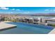 Beautiful infinity pool with serene views of the lake and mountain landscape at 29 Falling Ridge Ln, Henderson, NV 89011