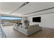 Bright living room with expansive views and ample seating at 29 Falling Ridge Ln, Henderson, NV 89011