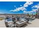 Resort-style swimming pool with a fire pit and comfortable lounge seating at 29 Falling Ridge Ln, Henderson, NV 89011