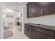 Modern bathroom featuring dual vanities, ample storage, and a bright, spacious layout at 302 Watteau Ct, Henderson, NV 89012
