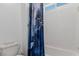 Stylish bathroom featuring a bathtub with shower and tile surround at 302 Watteau Ct, Henderson, NV 89012