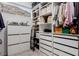 Closet featuring custom shelving and storage with a great view from the window at 302 Watteau Ct, Henderson, NV 89012