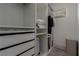 Bright walk-in closet with custom shelving and ample storage at 302 Watteau Ct, Henderson, NV 89012