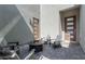 Private courtyard featuring a cozy seating area with a fire pit and sleek modern doors at 302 Watteau Ct, Henderson, NV 89012