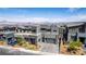 Contemporary two-story home boasting modern design, desert landscaping, and a paved driveway at 302 Watteau Ct, Henderson, NV 89012