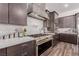 Modern kitchen design featuring stainless steel appliances and elegant countertops at 302 Watteau Ct, Henderson, NV 89012