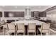 Gourmet kitchen featuring a large center island and stainless steel appliances at 302 Watteau Ct, Henderson, NV 89012