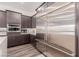 The gourmet kitchen features stainless steel appliances and modern finishes at 302 Watteau Ct, Henderson, NV 89012