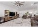 Comfortable living room with a large TV and stylish decor at 302 Watteau Ct, Henderson, NV 89012