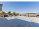 Backyard featuring an automatic pool cover, privacy wall, and views of neighborhood at 302 Watteau Ct, Henderson, NV 89012