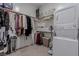 Convenient walk-in closet with organization system and storage space at 302 Watteau Ct, Henderson, NV 89012