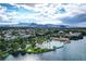 Overhead shot of a lakeside community with sandy beach, palm trees, and community buildings at 3151 Soaring Gulls Dr # 2035, Las Vegas, NV 89128