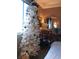 Bedroom with a white Christmas tree decorated with ornaments and ribbons at 3151 Soaring Gulls Dr # 2035, Las Vegas, NV 89128