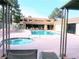 Inviting community pool area features lounge chairs, a hot tub, and covered seating, perfect for relaxation and socializing at 3151 Soaring Gulls Dr # 2035, Las Vegas, NV 89128