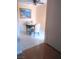 Cozy kitchen dining area with a round table, two chairs, and a scenic painting on the wall at 3151 Soaring Gulls Dr # 2035, Las Vegas, NV 89128