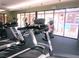 Community gym with treadmills and other exercise equipment overlooking pool at 3151 Soaring Gulls Dr # 2035, Las Vegas, NV 89128