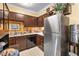 Efficient kitchen with stainless steel refrigerator and ample cabinet space at 3151 Soaring Gulls Dr # 2035, Las Vegas, NV 89128