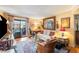 Cozy living room with elegant decor, balcony access, and a view at 3151 Soaring Gulls Dr # 2035, Las Vegas, NV 89128