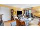 Comfortable living room featuring a large television, desk space, and stylish furnishings at 3151 Soaring Gulls Dr # 2035, Las Vegas, NV 89128