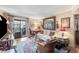Inviting living room with natural light, comfortable furnishings, and a private outdoor balcony at 3151 Soaring Gulls Dr # 2035, Las Vegas, NV 89128