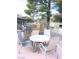 Outdoor dining area with a built-in grill, perfect for entertaining and enjoying outdoor meals at 3151 Soaring Gulls Dr # 2035, Las Vegas, NV 89128