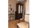 Well decorated room, including gold chair, mirrors, and wood cabinet at 3151 Soaring Gulls Dr # 2035, Las Vegas, NV 89128