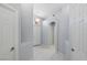 Welcoming foyer with white marble floors and access to multiple rooms at 3197 Castle Canyon Ave, Henderson, NV 89052