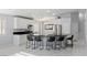 Spacious kitchen featuring modern appliances, breakfast bar, and plenty of natural light at 3197 Castle Canyon Ave, Henderson, NV 89052