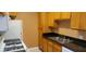 Functional kitchen featuring essential appliances and a double sink for convenience at 3318 N Decatur Blvd # 1002, Las Vegas, NV 89130