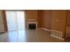 Comfortable living room features tile flooring, fireplace, and sliding glass doors at 3318 N Decatur Blvd # 1002, Las Vegas, NV 89130