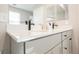 Elegant bathroom with a double vanity, quartz countertop, sleek black fixtures, and minimalist design for a modern aesthetic at 3525 Serravalle Ln, Henderson, NV 89044