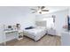 Bright bedroom with light-colored walls, wood-look flooring, and a large bed at 3814 Connie Ave, Las Vegas, NV 89115