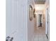 Hallway with mirrors and tile floors leads to the rest of the house at 3814 Connie Ave, Las Vegas, NV 89115