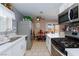 Well-lit kitchen featuring quartz countertops and stainless steel appliances at 3814 Connie Ave, Las Vegas, NV 89115