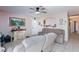 This living room is with tile floors, a ceiling fan, and comfortable seating at 3814 Connie Ave, Las Vegas, NV 89115