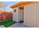 Tan colored shed with off-white trim in the backyard at 3814 Connie Ave, Las Vegas, NV 89115