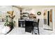 Entertaining space features wet bar with seating, display shelves and backyard access at 439 Cannes St, Henderson, NV 89015