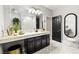 Bright bathroom features double vanity, marble countertops, and modern fixtures at 439 Cannes St, Henderson, NV 89015