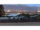 Distant city views from behind a fence with RV parking near a barn at 439 Cannes St, Henderson, NV 89015