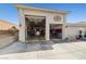 Exterior view of the car garage with open doors and access to the bays and car lifts at 439 Cannes St, Henderson, NV 89015